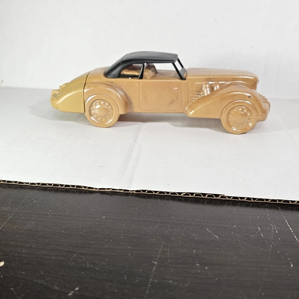 Avon Cord 37 Car Bottle. Tan Tai Winds After Shave Bottle